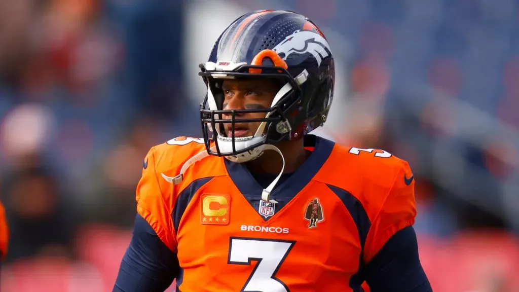 Russell Wilson looks on during a game with the Denver Broncos