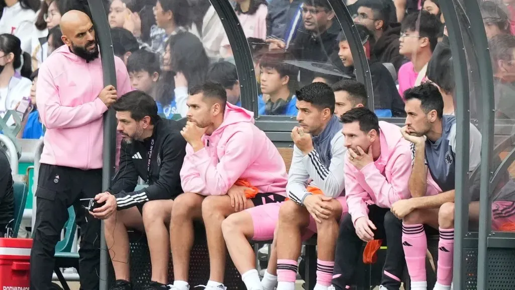 Messi watching Inter Miami's friendly in Hong Kong on the bench.