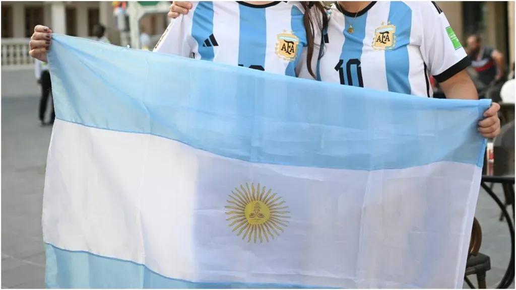 Argentina supporters hold the Argentine flag