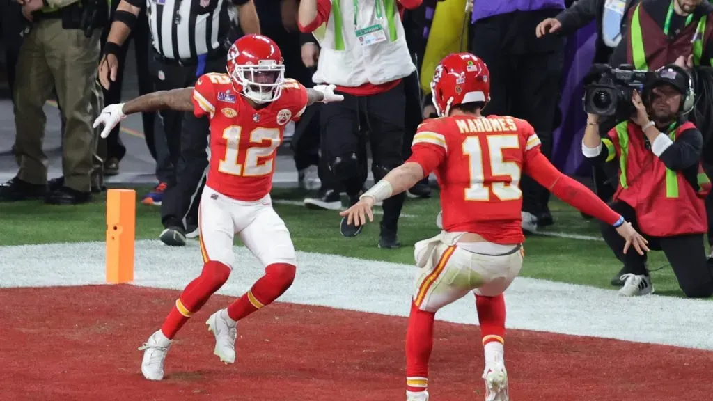 Mecole Hardman Jr. #12 of the Kansas City Chiefs celebrates with Patrick Mahomes #15 after scoring the game-winning touchdown in overtime to defeat the San Francisco 49ers 25-22 during Super Bowl LVIII at Allegiant Stadium on February 11, 2024 in Las Vegas, Nevada.