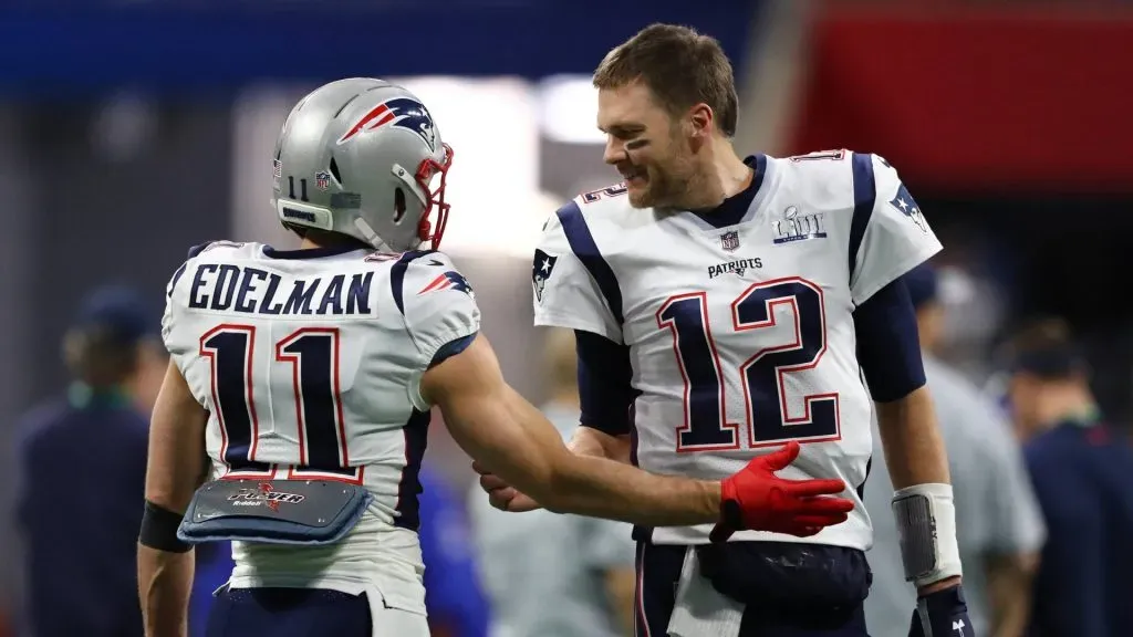 Julian Edelman (left) and Tom Brady.