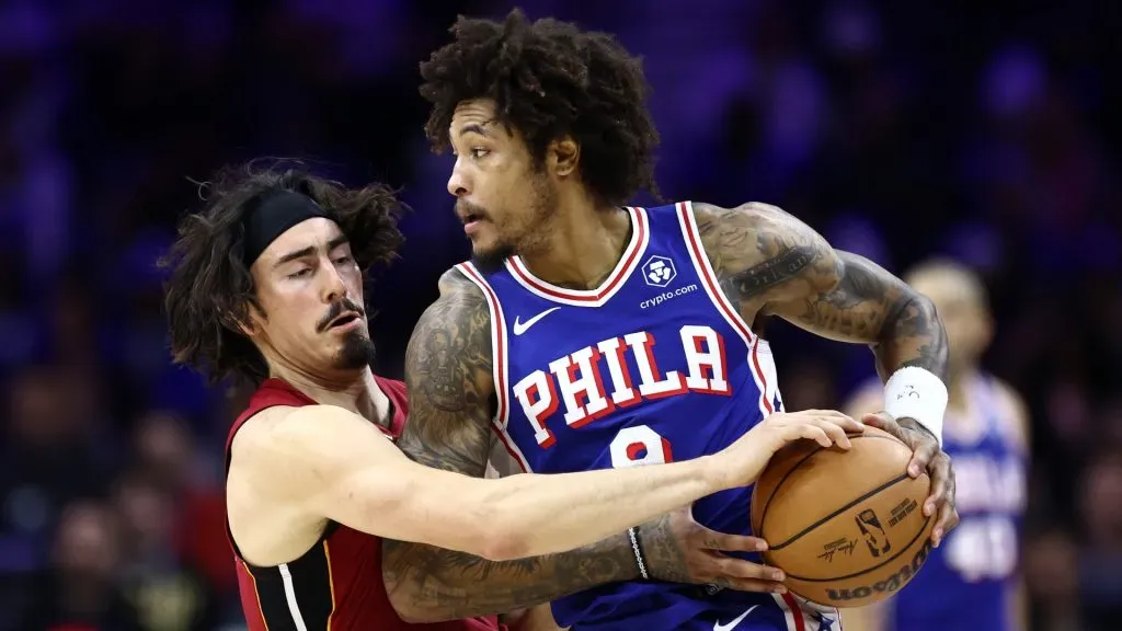 Jaime Jaquez Jr. #11 of the Miami Heat guards Kelly Oubre Jr. #9 of the Philadelphia 76ers during the third quarter at the Wells Fargo Center on March 18, 2024 in Philadelphia, Pennsylvania.