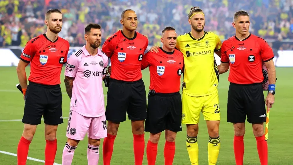 Lionel Messi #10 of Inter Miami and Walker Zimmerman #25 of Nashville SC pose with the game referees prior to the Leagues Cup 2023 final match between Inter Miami CF and Nashville SC at GEODIS Park on August 19, 2023 in Nashville, Tennessee.