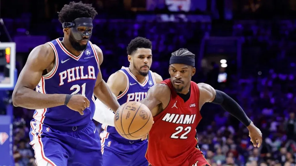 Jimmy Butler #22 of the Miami Heat dribbles against Joel Embiid #21 of the Philadelphia 76ers during the second half in Game Six of the 2022 NBA Playoffs Eastern Conference Semifinals at Wells Fargo Center on May 12, 2022 in Philadelphia, Pennsylvania.