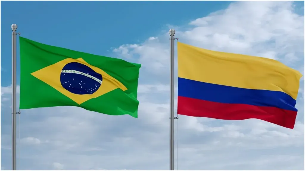 Colombia and Brazil flags waving together ā IMAGO / Pond5 Images