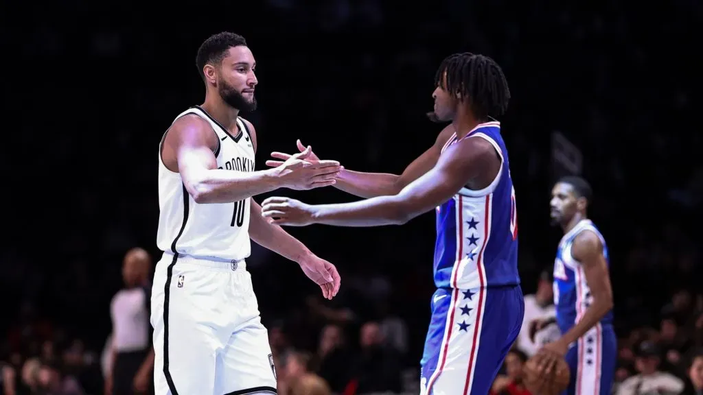Ben Simmons #10 of the Brooklyn Nets greets Tyrese Maxey #0 of the Philadelphia 76ers before the preseason game at Barclays Center on October 16, 2023 in New York City.
