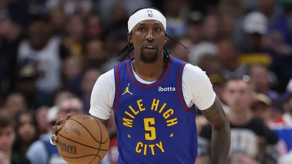 Kentavious Caldwell-Pope #5 of the Denver Nuggets brings the ball down the court against the Minnesota Timberwolves in the first quarter during Game One of the Western Conference Second Round Playoffs at Ball Arena on May 04, 2024 in Denver, Colorado.