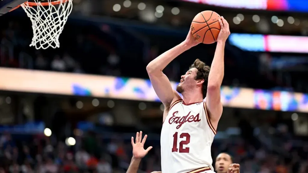 Quinten Post #12 of the Boston College Eagles drives to the basket in the first half against the Miami Hurricanes in the First Round of the ACC Men’s Basketball Tournament. Photo by Greg Fiume/Getty Images