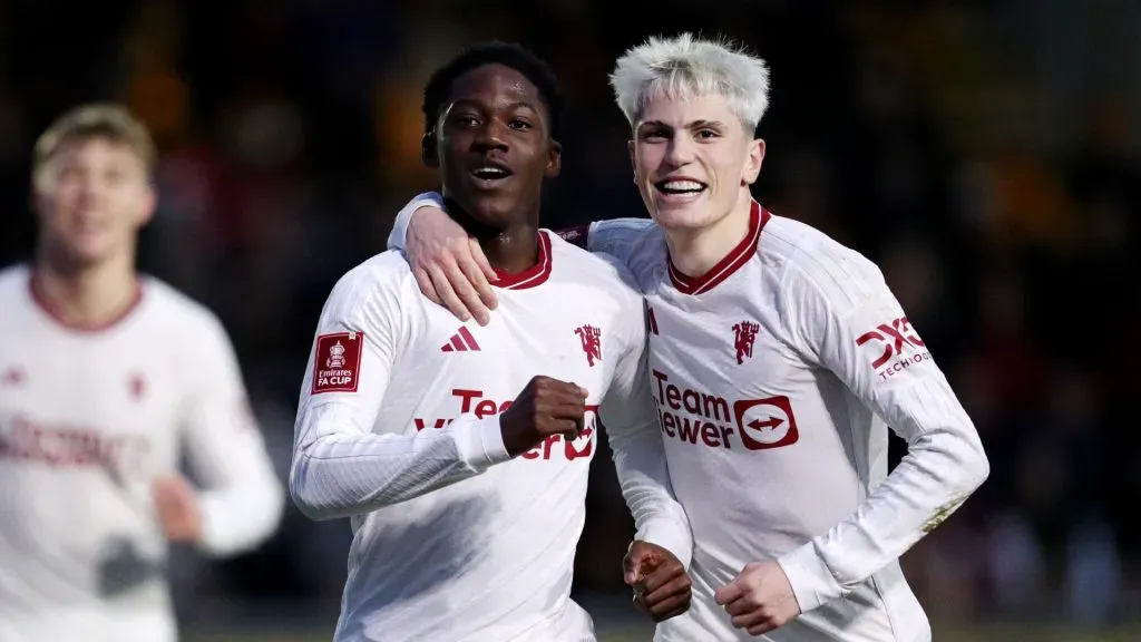 Kobbie Mainoo celebrates with Alejandro Garnacho after scoring his teamâs second goal during the Emirates FA Cup Fourth Round match between Newport County and Manchester United. Ryan Hiscott/Getty Images