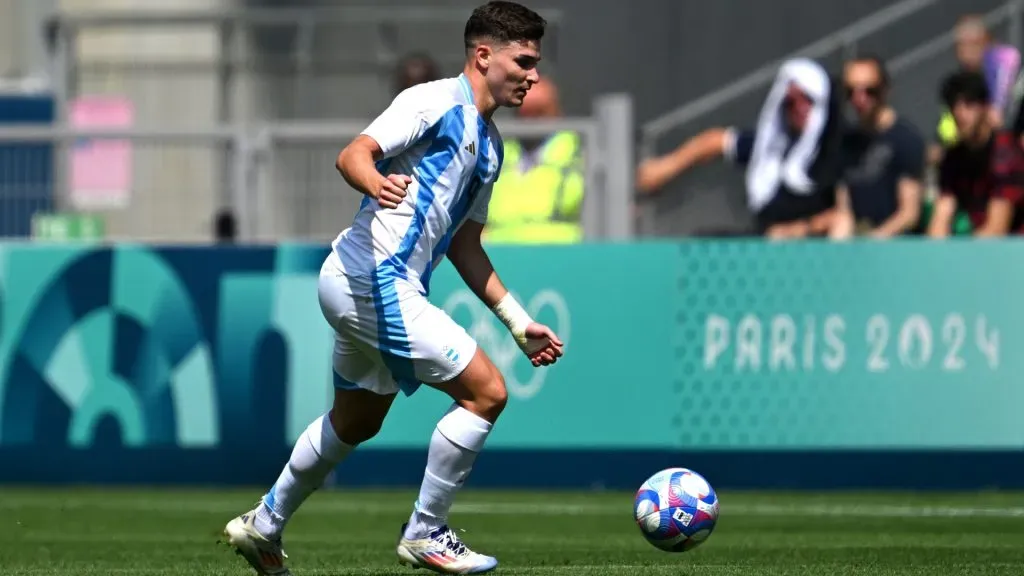 Julian Alvarez #9 of Team Argentina runs with the ball during the Menâs group B match between Argentina and Morocco during the Olympic Games Paris 2024 at Stade Geoffroy-Guichard on July 24, 2024 in Saint-Etienne, France. (Photo by Tullio M. Puglia/Getty Images)