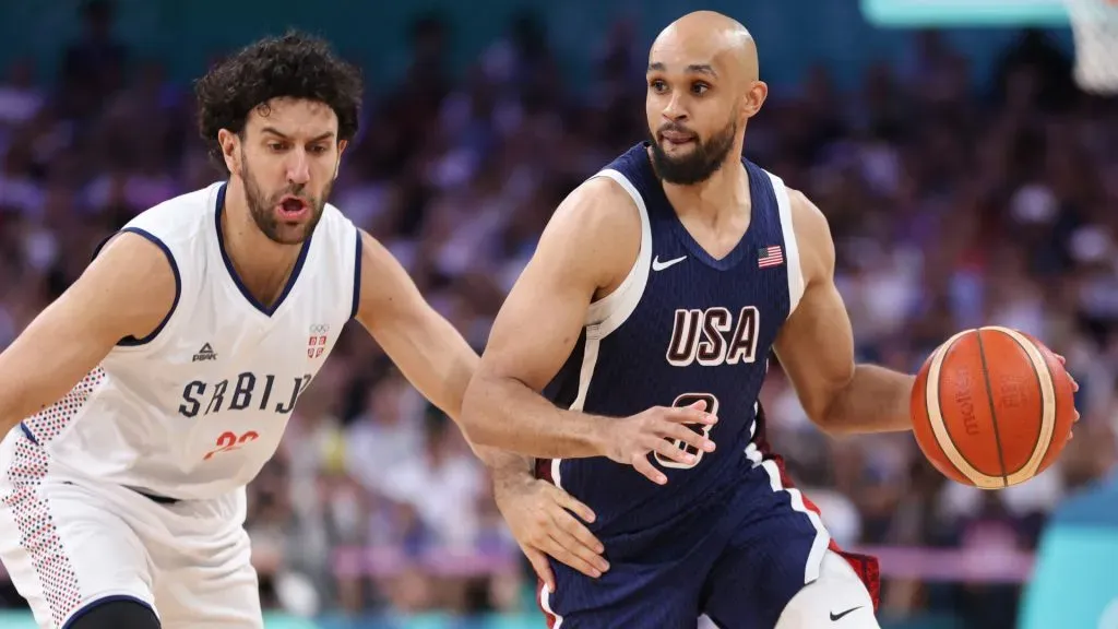 Derrick White #8 of Team United States drives to the basket against Vasilije Micic #22 of Team Serbia during the second half of the Menās Group Phase ā Group C game between Serbia and the United States. Gregory Shamus/Getty Images