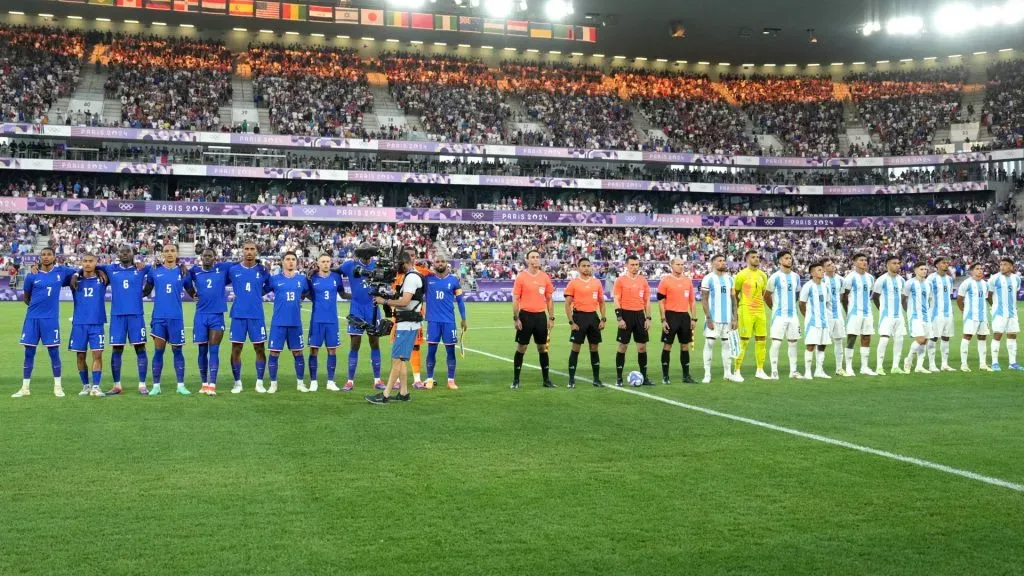 Players Team France and Team Argentina line up prior to the Menās Quarterfinal match between France and Argentina during the Olympic Games Paris 2024 at Nouveau Stade de Bordeaux on August 02, 2024 in Bordeaux, France. (Photo by Juan Manuel Serrano Arce/Getty Images)