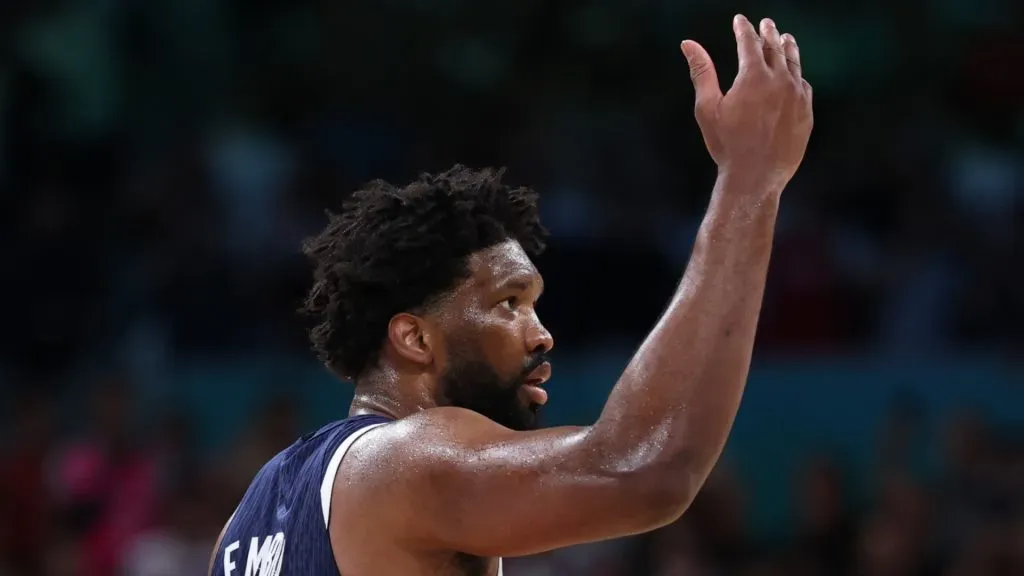 Joel Embiid #11 of Team United States gestures towards the crowd during a Men's basketball group phase-group C game between the United States and Puerto Rico on day eight of the Olympic Games Paris 2024 at Stade Pierre Mauroy on August 03, 2024 in Lille, France.