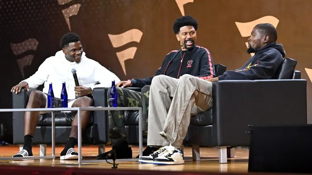 Anthony Edwards, Jalen Rose and Kevin Durant speak onstage during the Fanatics Fest NYC 2024. Roy Rochlin/Getty Images