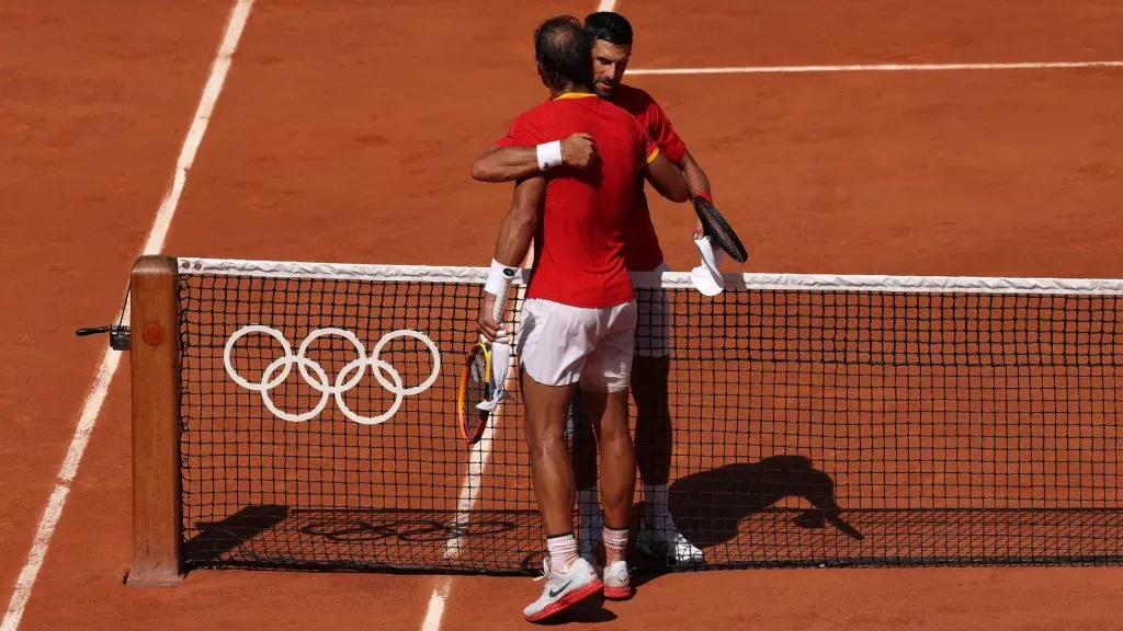 Winner Novak Djokovic is congratulated by Rafael Nadal after the Men’s Singles second round match of the Olympic Games Paris 2024. Matthew Stockman/Getty Images