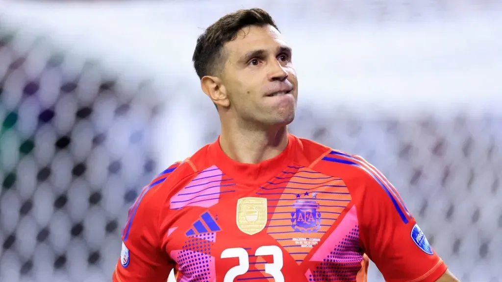 Emiliano Martinez of Argentina saves the first penalty from Ecuador in the penalty shoot out during the CONMEBOL Copa America 2024 quarter-final match between Argentina and Ecuador at NRG Stadium on July 04, 2024 in Houston, Texas.