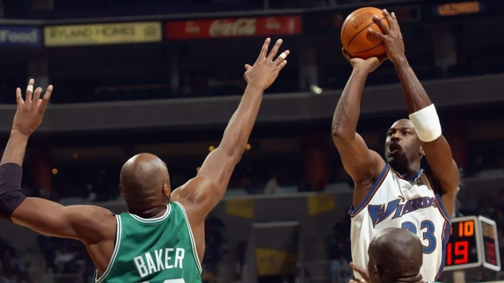 Michael Jordan #23 of the Washington Wizards shoots over Vin Baker #42 of the Boston Celtics. Doug Pensinger/Getty Images