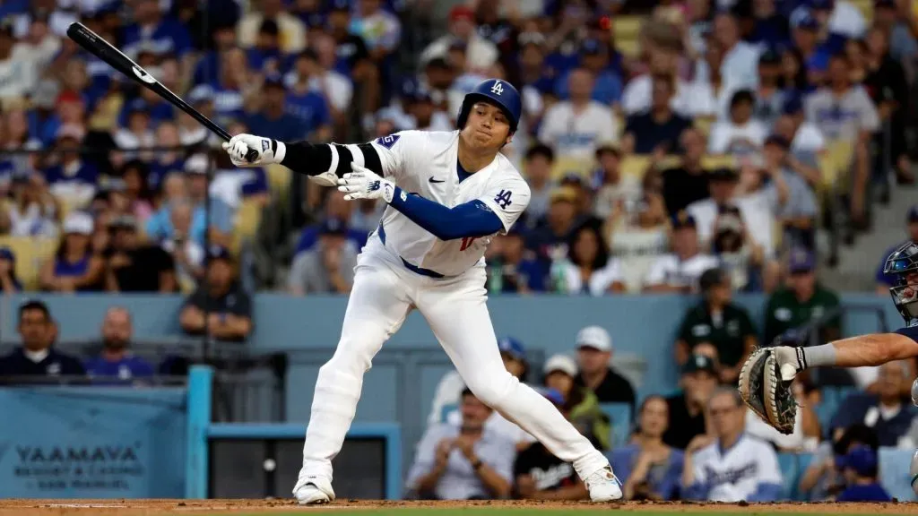 Shohei Ohtani #17 of the Los Angeles Dodgers strikes out against starting pitcher Bryce Miller #50 of the Seattle Mariners during the first inning at Dodger Stadium on August 20, 2024 in Los Angeles, California. (Photo by Kevork Djansezian/Getty Images)
