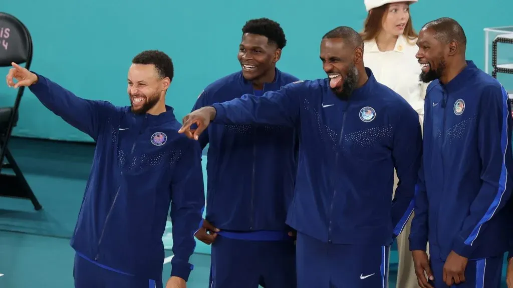 Gold medalists Stephen Curry, Anthony Edwards, LeBron James and Kevin Durant of Team United States react on the podium during the Menās basketball medal ceremony on day fifteen of the Olympic Games Paris 2024. (Photo by Michael Reaves/Getty Images)
