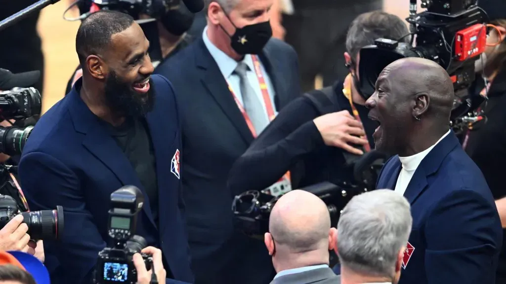 Michael Jordan and LeBron James talk after the presentation of the NBA 75th Anniversary Team during the 2022 NBA All-Star Game at Rocket Mortgage Fieldhouse on February 20, 2022 in Cleveland, Ohio. (Photo by Jason Miller/Getty Images)