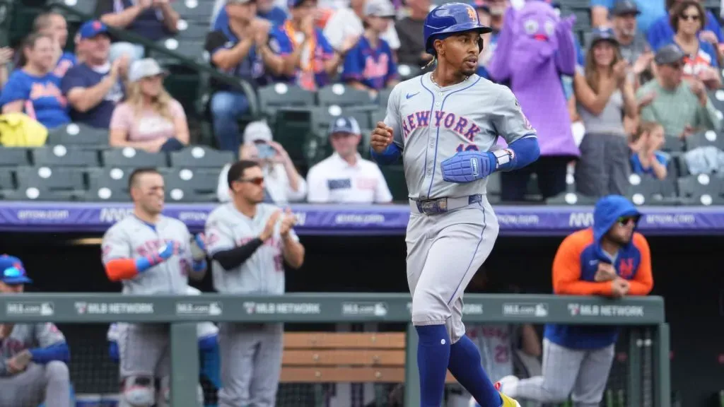 New York shortstop Francisco Lindor (12) scores a run during the game between the New York Mets and Colorado Rockies game held at Coors Field. IMAGO / ZUMA Press Wire