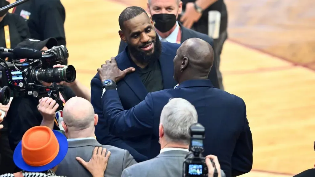 Michael Jordan and LeBron James hug after the presentation of the NBA 75th Anniversary Team during the 2022 NBA All-Star Game at Rocket Mortgage Fieldhouse on February 20, 2022 in Cleveland, Ohio. (Photo by Jason Miller/Getty Images)