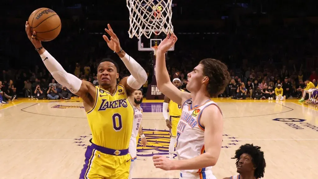 Russell Westbrook #0 of the Los Angeles Lakers scores past Josh Giddey #3 and Jalen Williams #8 of the Oklahoma City Thunder in a game in which LeBron James #6 passed Kareem Abdul-Jabbar to become the NBA’s all-time leading scorer, surpassing Abdul-Jabbar’s career total of 38,387 points against the Oklahoma City Thunder at Crypto.com Arena on February 07, 2023 in Los Angeles, California. (Photo by Harry How/Getty Images)