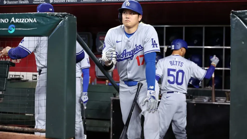 Shohei Ohtani #17 of the Los Angeles Dodgers stands on the dugout stairs before the first inning against the Arizona Diamondbacks at Chase Field on September 02, 2024 in Phoenix, Arizona. (Photo by Chris Coduto/Getty Images)