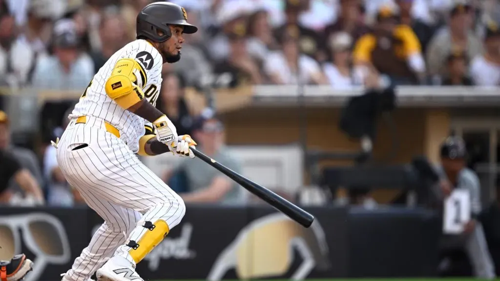 Luis Arraez #4 of the San Diego Padres hits an RBI single against the Detroit Tigers during the third inning at Petco Park on September 02, 2024 in San Diego, California. (Photo by Orlando Ramirez/Getty Images)