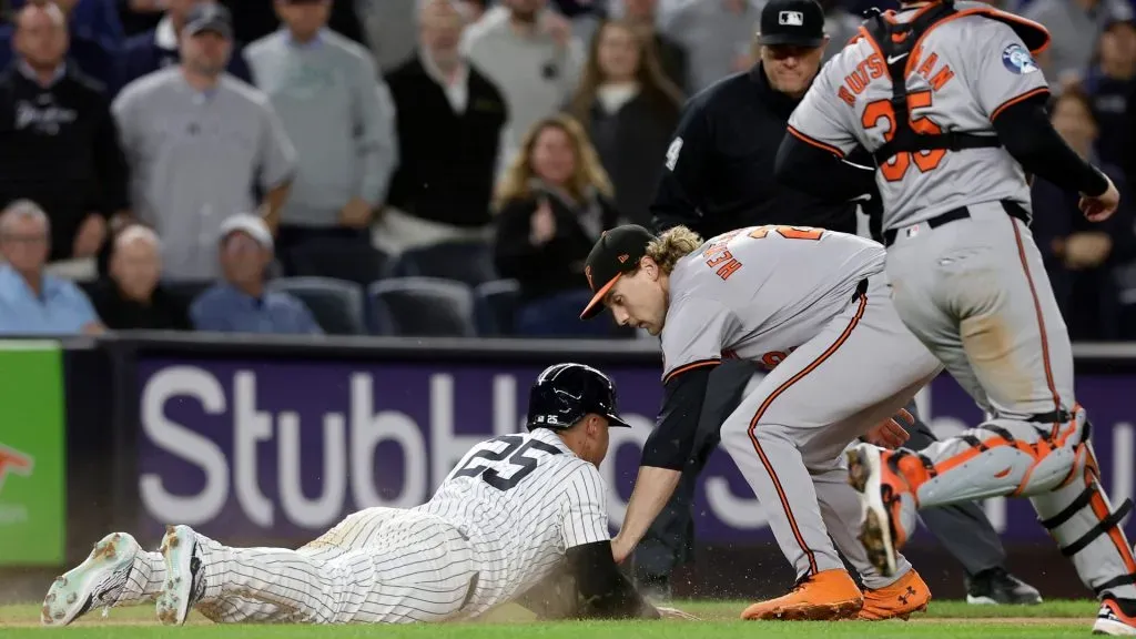Gunnar Henderson #2 of the Baltimore Orioles tags out Gleyber Torres #25 of the New York Yankees to end the seventh inning at Yankee Stadium on September 24, 2024 in New York City. (Photo by Jim McIsaac/Getty Images)