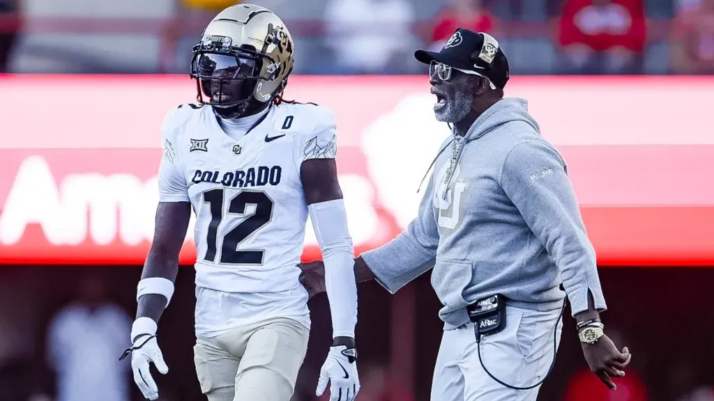 Colorado Buffaloes head coach Deion Sanders walks on to the field to talk with Colorado Buffaloes Travis Hunter 12 in action during a NCAA, College League, USA Division 1 football game between Colorado Buffalos and the Nebraska Cornhuskers at Memorial Stadium in Lincoln, NE.