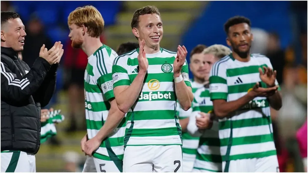 Celtic’s Alistair Johnston (centre) and team-mates applaud the fans – IMAGO / PA Images