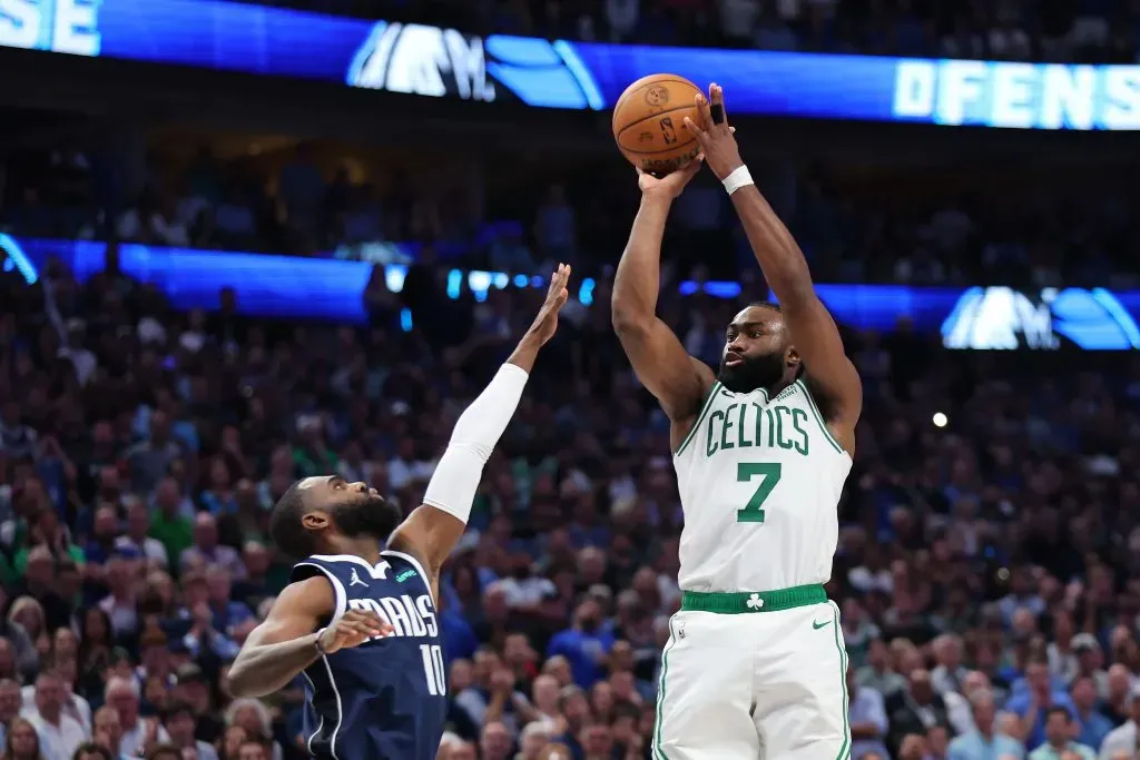 Jaylen Brown attempts a shot while being guarded by Tim Hardaway Jr. #10 of the Dallas Mavericks in the fourth quarter in Game Three of the 2024 NBA Finals. Stacy Revere/Getty Images