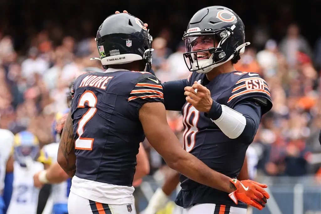 CHICAGO, ILLINOIS – SEPTEMBER 29: DJ Moore #2 and Caleb Williams #18 of the Chicago Bears celebrate a touchdown against the Los Angeles Rams at Soldier Field on September 29, 2024 in Chicago, Illinois. (Photo by Michael Reaves/Getty Images)