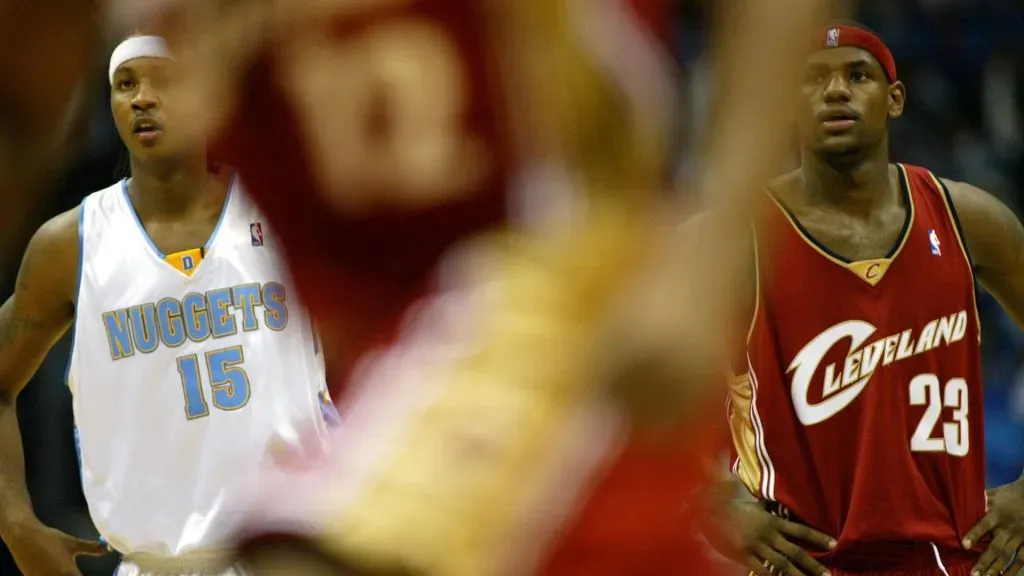 LeBron James #23 of the Cleveland Cavaliers and Carmelo Anthony #15 of the Denver Nuggets stand on November 5, 2003 at Gund Arena in Cleveland, Ohio.