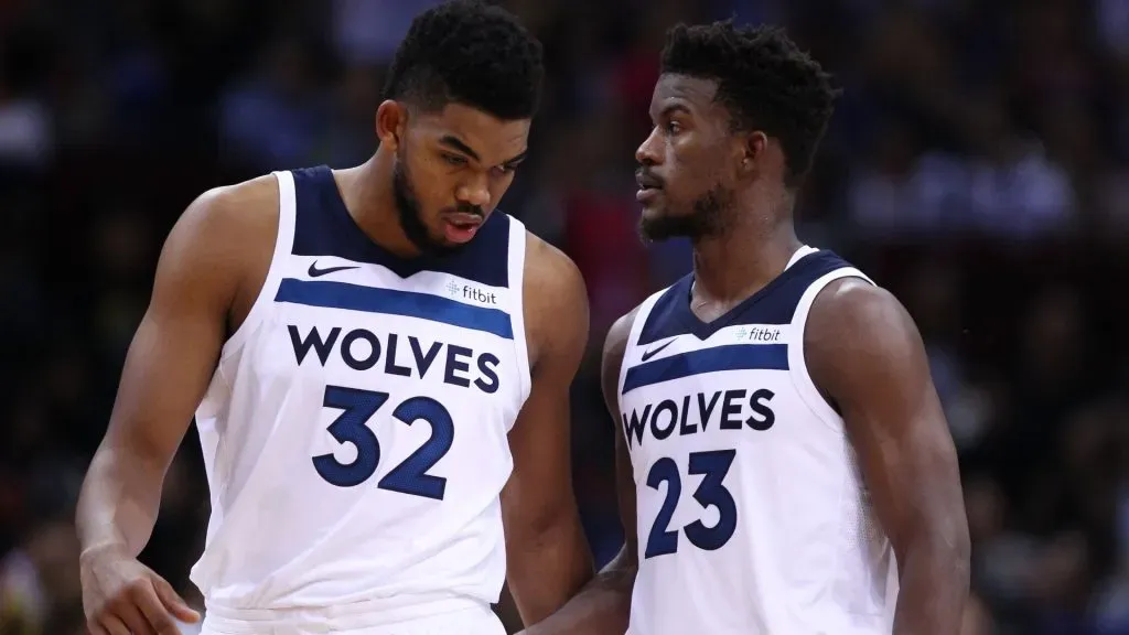 Jimmy Butler #23 and Karl-Anthony Towns #32 of the Minnesota Timberwolves talk to each other during the game between the Minnesota Timberwolves and the Golden State Warriors as part of 2017 NBA Global Games China at Universidade Center on October 5, 2017 in Shenzhen, China.