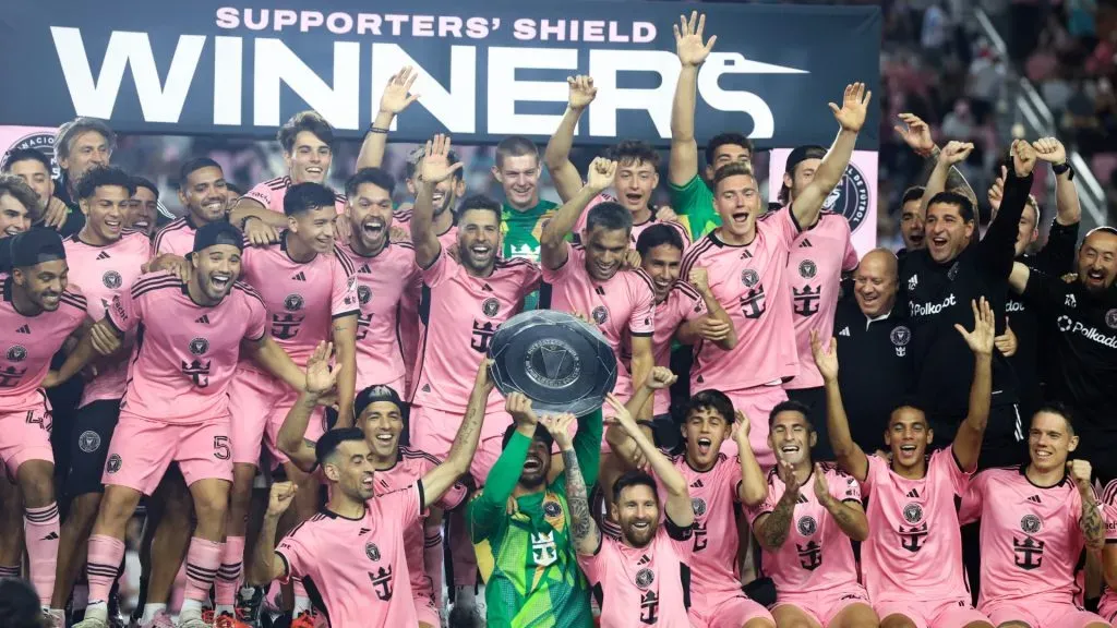 Lionel Messi #10 and Inter Miami lift the Supporters' Shield after defeating New England Revolution at Chase Stadium on October 19, 2024 in Fort Lauderdale, Florida.