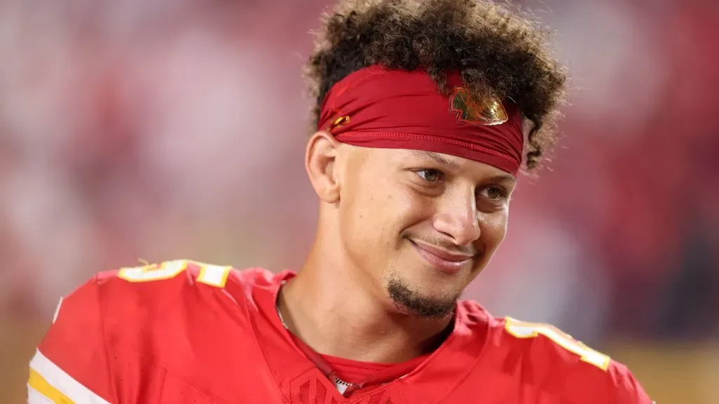 Patrick Mahomes #15 of the Kansas City Chiefs smiles after their 27-20 win over the Baltimore Ravens at GEHA Field at Arrowhead Stadium on September 05, 2024. (Source: Christian Petersen/Getty Images)