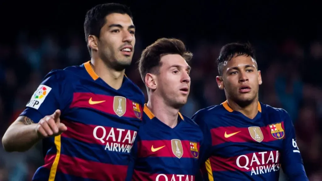 Luis Suarez (L) of FC Barcelona celebrates with his teammates Lionel Messi (C) and Neymar Santos Jr (R) after scoring his team's second goal during the La Liga match between FC Barcelona and Sporting Gijon at Camp Nou on April 23, 2016 in Barcelona, Spain.