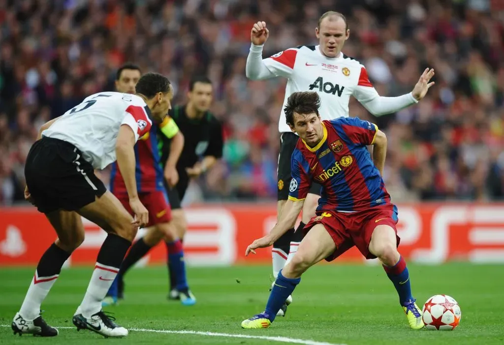 Lionel Messi of FC Barcelona in action against Rio Ferdinand and Wayne Rooney of Manchester United during the UEFA Champions League final between FC Barcelona and Manchester United FC at Wembley Stadium. Laurence Griffiths/Getty Images