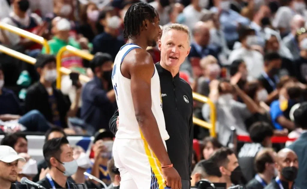Jonathan Kuminga (left) and Steve Kerr.