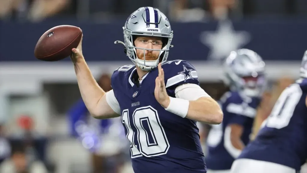 Cooper Rush #10 of the Dallas Cowboys throws a pass in the fourth quarter of a game against the Detroit Lions at AT&T Stadium on October 13, 2024 in Arlington, Texas.