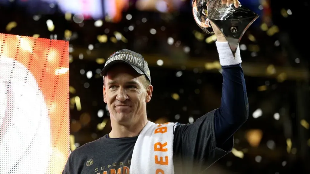Peyton Manning #18 of the Denver Broncos celebrates with the Vince Lombardi Trophy after Super Bowl 50 at Levi’s Stadium on February 7, 2016. (Source: Patrick Smith/Getty Images)