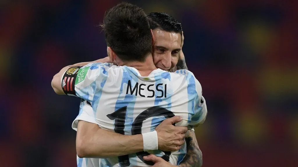 Lionel Messi of Argentina celebrates after scoring the opening goal of his team with Angel Di Maria of Argentina during a match between Argentina and Chile. Juan Mabromata – Pool/Getty Images