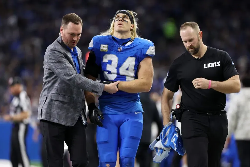 DETROIT, MICHIGAN – NOVEMBER 17: Alex Anzalone #34 of the Detroit Lions is helped off the field after being injured during a play in the second quarter of a game against the Jacksonville Jaguars at Ford Field on November 17, 2024 in Detroit, Michigan. (Photo by Gregory Shamus/Getty Images)