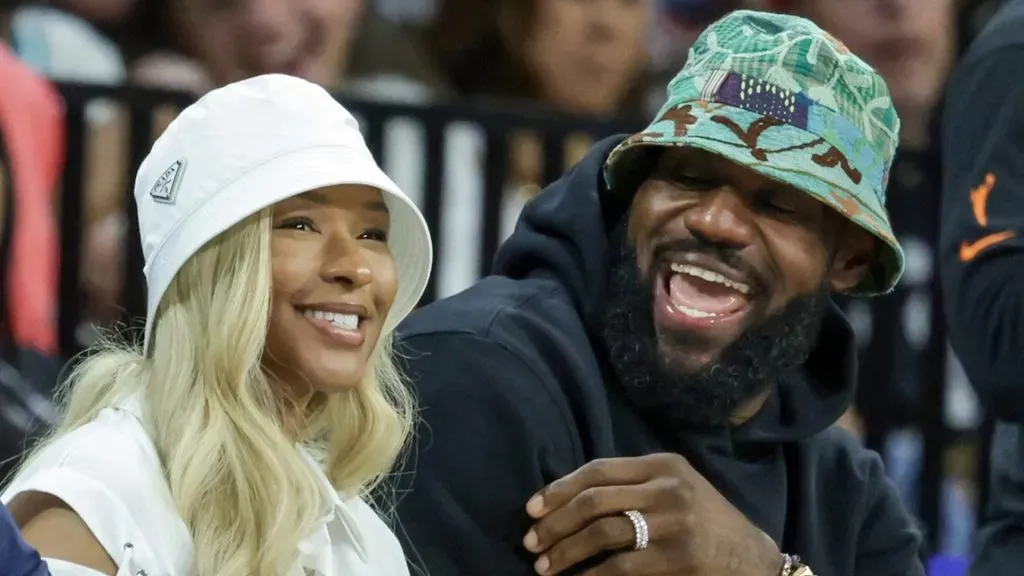 Savannah James (L) and NBA player LeBron James of the Los Angeles Lakers attend a game between the New York Liberty and the Las Vegas Aces at Michelob ULTRA Arena on June 15, 2024 in Las Vegas, Nevada. The Liberty defeated the Aces 90-82.