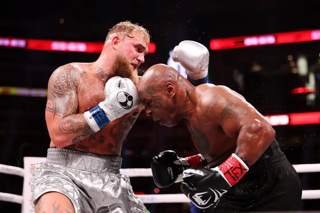 ARLINGTON, TEXAS – NOVEMBER 15: (L-R) Jake Paul and Mike Tyson fight during LIVE On Netflix: Jake Paul vs. Mike Tyson at AT&T Stadium on November 15, 2024 in Arlington, Texas. (Photo by Al Bello/Getty Images for Netflix © 2024)