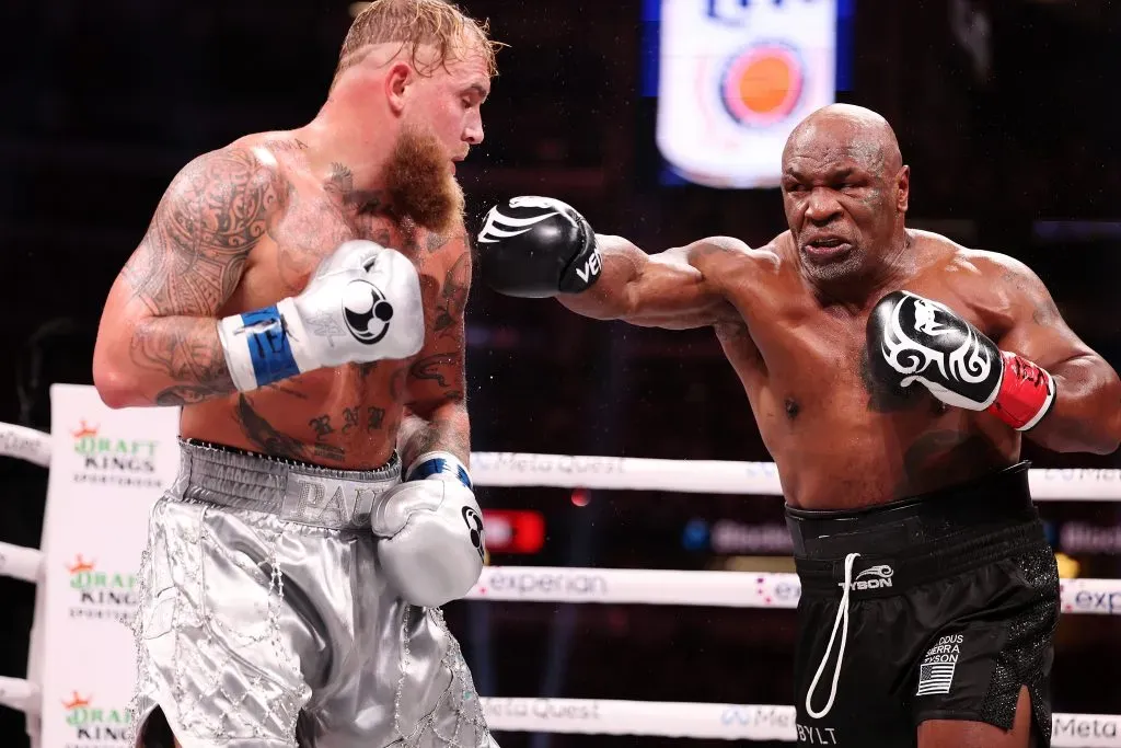 ARLINGTON, TEXAS – NOVEMBER 15: (L-R) Jake Paul and Mike Tyson fight during LIVE On Netflix: Jake Paul vs. Mike Tyson at AT&T Stadium on November 15, 2024 in Arlington, Texas. (Photo by Al Bello/Getty Images for Netflix © 2024)
