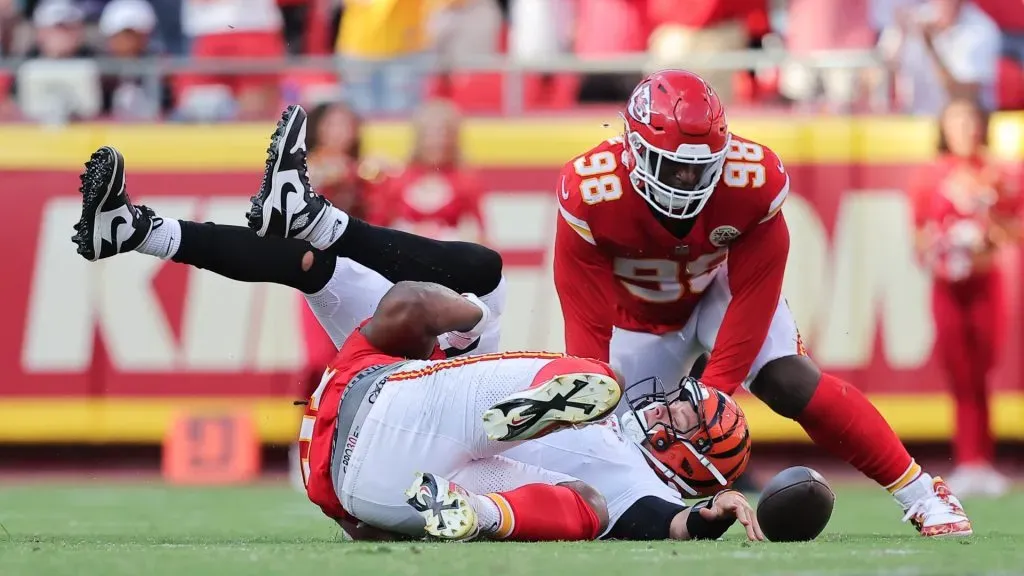Mike Danna #51 of the Kansas City Chiefs forces a fumble against Joe Burrow #9 of the Cincinnati Bengals during the fourth quarter at GEHA Field at Arrowhead Stadium on September 15, 2024 in Kansas City, Missouri.