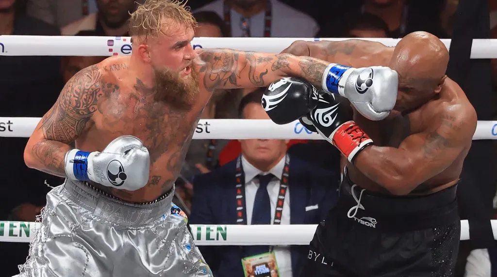 Jake Paul throws a left on Mike Tyson during a heavyweight bout at AT&T Stadium on November 15, 2024 in Arlington, Texas. (Photo by Christian Petersen/Getty Images)